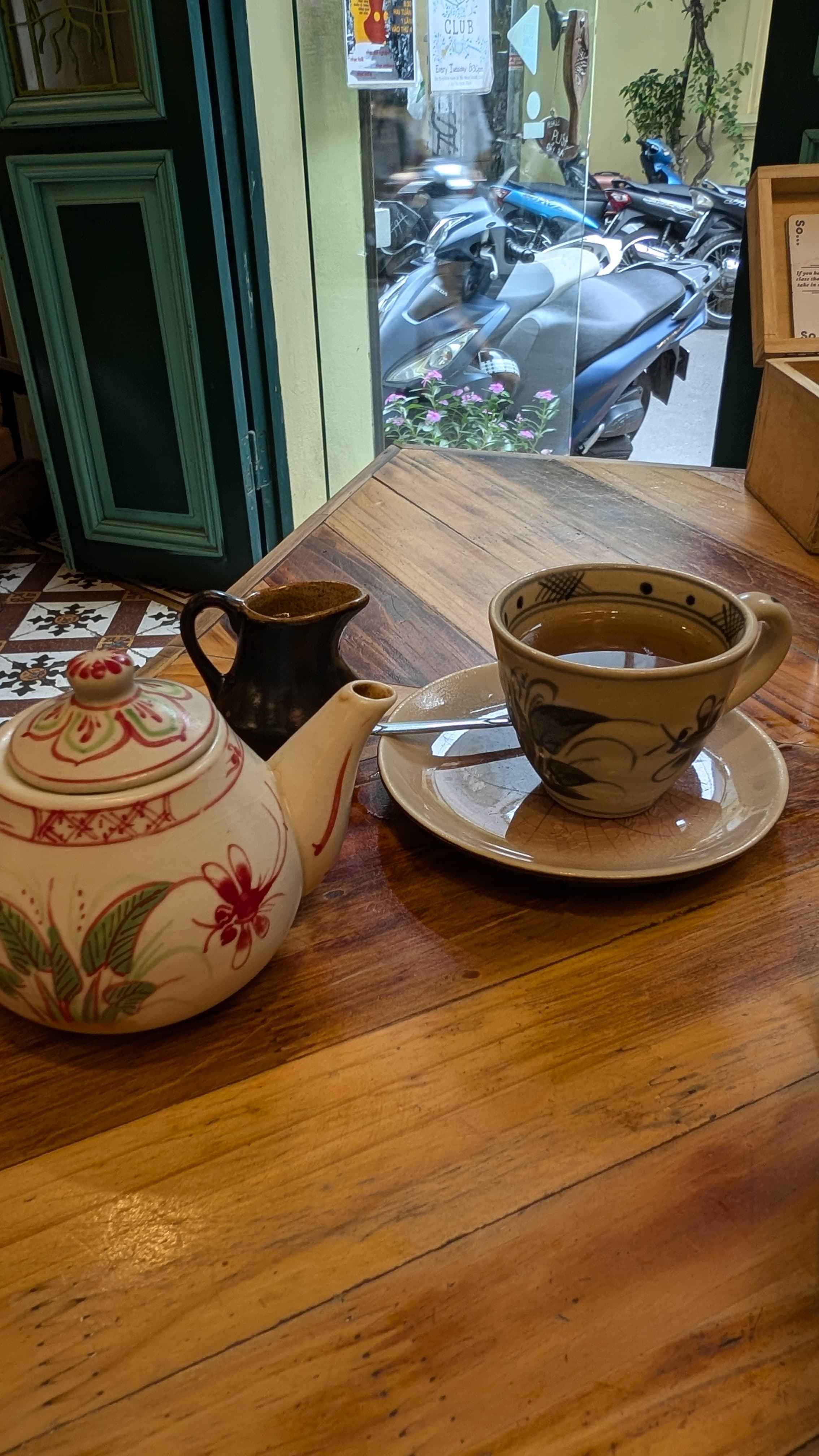 Traditional Vietnamese tea set on a wooden table