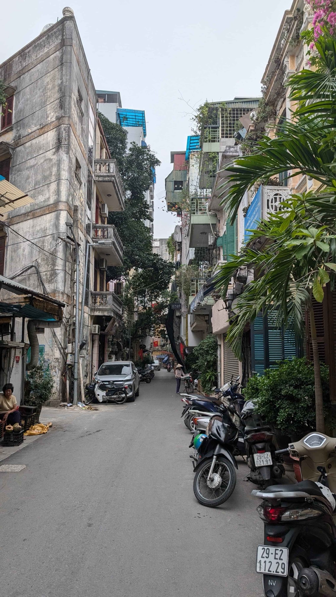 Narrow Hanoi alley leading to the cafe