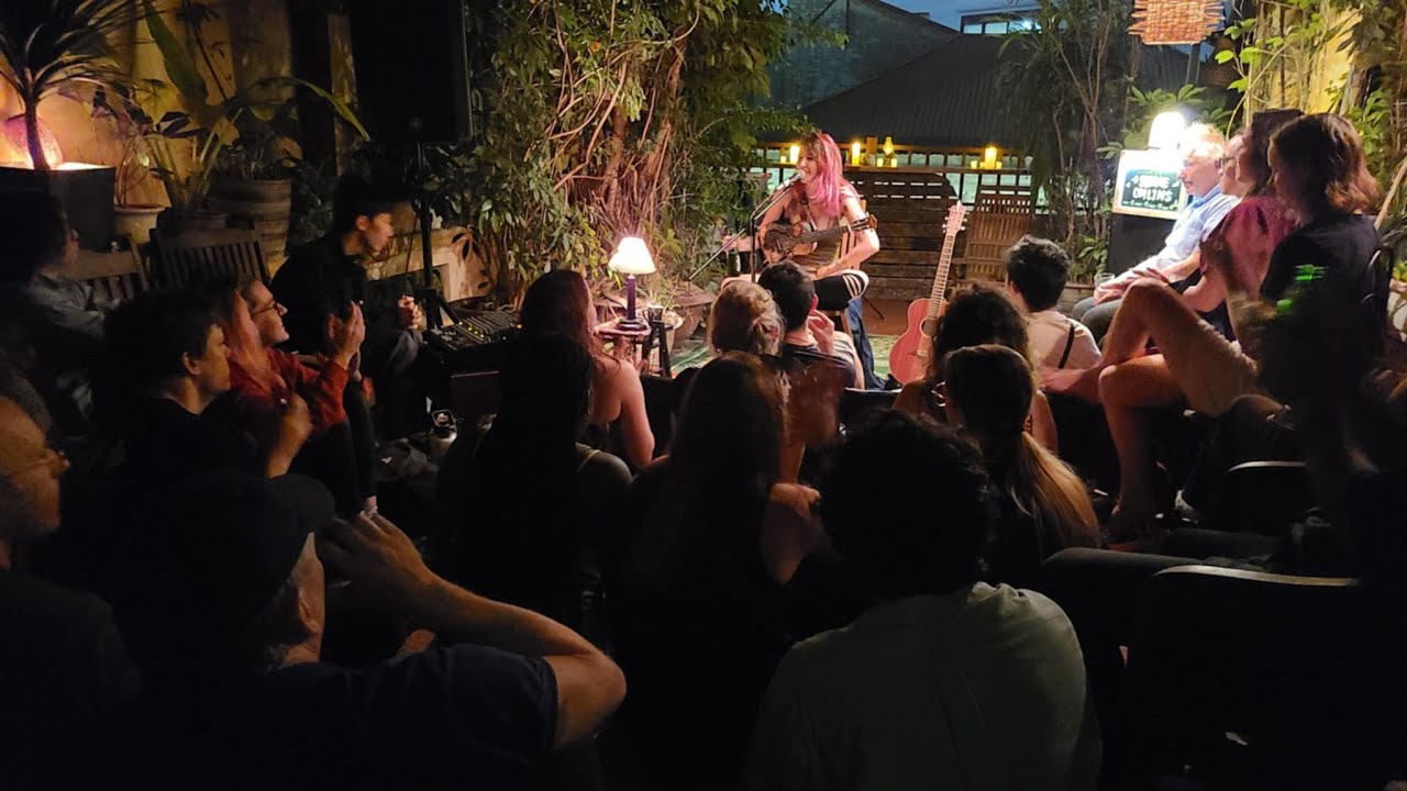 Live acoustic performance at the Tiny Music Club