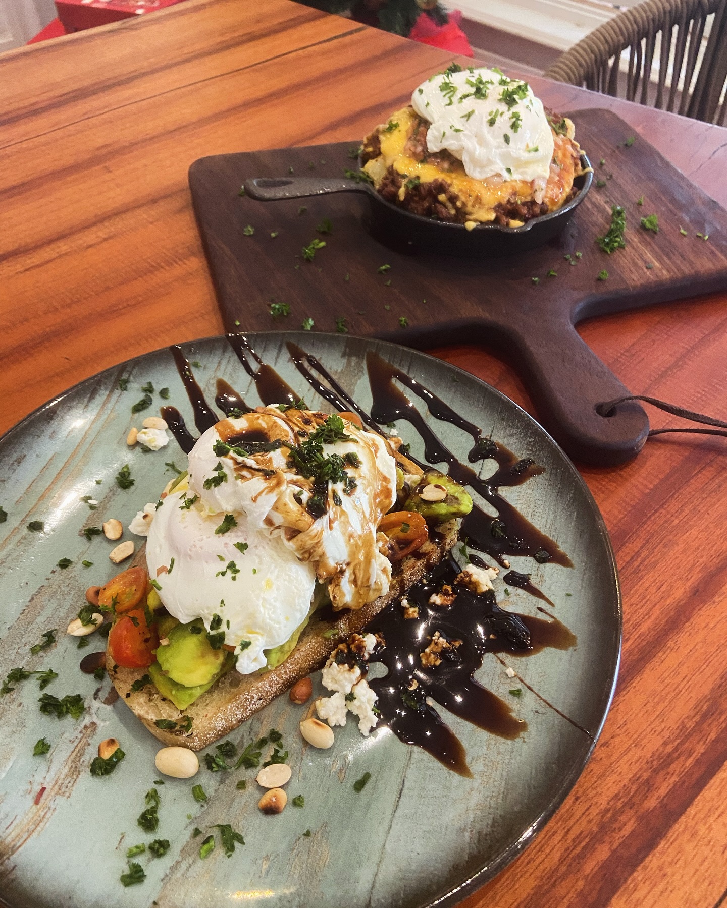 Brunch spread with eggs benedict and skillet at Luna's Restaurant